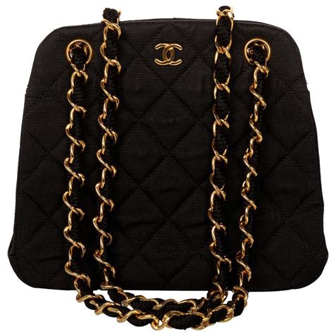 chanel black quilted bag with gold chain